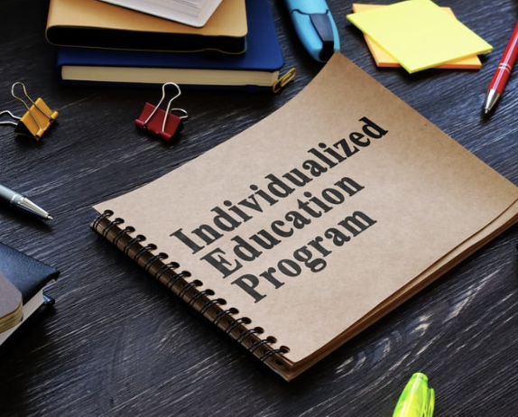 Parent and advocate reviewing an IEP